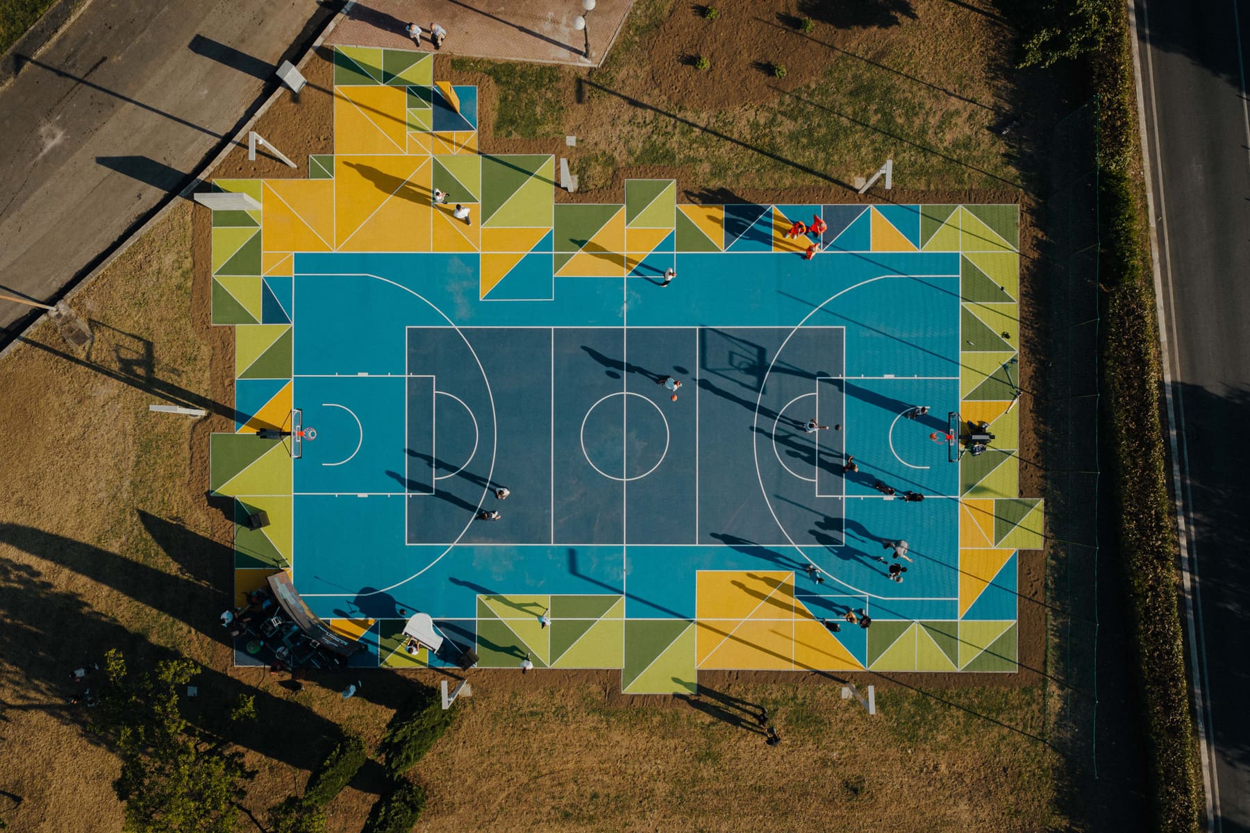 Aerial view of a brightly coloured GreenSet urban multisport court